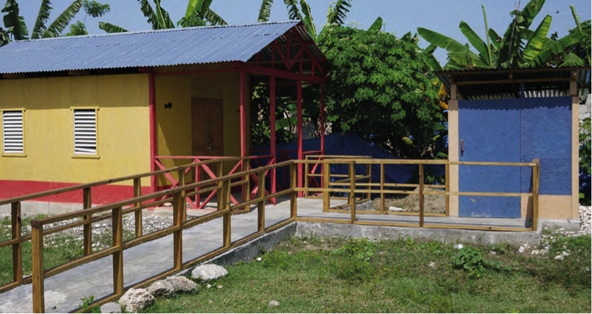 A shelter, accessed by a ramp and a washroom facility nearby