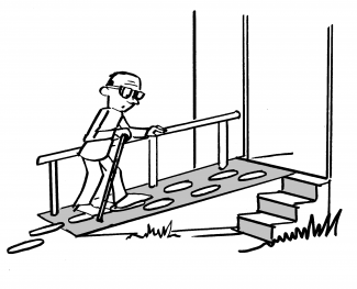 Toilet with a ramp made of concrete, which has footsteps painted on it. Next to the ramp is a stair.